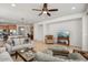 Open living room with kitchen view and comfortable seating at 20712 N 273Rd Ave, Buckeye, AZ 85396
