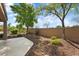 Backyard with gravel, trees, and a patio at 20712 N 273Rd Ave, Buckeye, AZ 85396