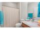 Clean bathroom with shower/tub combo, vanity, and linen storage at 20712 N 273Rd Ave, Buckeye, AZ 85396