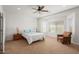 Relaxing bedroom with ceiling fan and neutral decor at 20712 N 273Rd Ave, Buckeye, AZ 85396