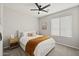 Bright bedroom with a queen-size bed and nightstand at 41448 N Bent Creek Way, Phoenix, AZ 85086