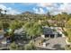 Aerial view of a house with a large driveway and a mountain backdrop at 5919 N 45Th St, Phoenix, AZ 85018