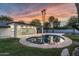 Inviting kidney shaped pool with large patio and sunset view at 5919 N 45Th St, Phoenix, AZ 85018