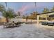 Relaxing patio features a dining area, comfortable seating, and a view of the pool at 5919 N 45Th St, Phoenix, AZ 85018