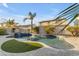 Inviting pool with spa and waterfall feature at 2568 E Aloe Pl, Chandler, AZ 85286