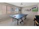 Game room featuring ping pong table and TV at 3331 W Hemingway Ln, Anthem, AZ 85086