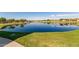 Community lake with walking path and green space at 23095 E Mewes Rd, Queen Creek, AZ 85142