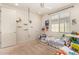 Well-lit bedroom with twin beds, window, and playful decor at 23095 E Mewes Rd, Queen Creek, AZ 85142