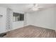 Bright bedroom with laminate flooring and patterned curtains at 2650 W Union Hills Dr # 54, Phoenix, AZ 85027