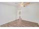 Bedroom with wood-look floors and ceiling fan at 2650 W Union Hills Dr # 54, Phoenix, AZ 85027