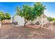 Mobile home with covered patio and mature citrus tree at 2650 W Union Hills Dr # 54, Phoenix, AZ 85027