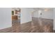 Open concept living room, kitchen, and dining area with laminate flooring at 2650 W Union Hills Dr # 54, Phoenix, AZ 85027
