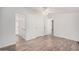 Large bedroom with laminate flooring and access to bathroom at 2650 W Union Hills Dr # 54, Phoenix, AZ 85027