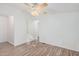 Bedroom with wood-look floors and ceiling fan at 2650 W Union Hills Dr # 54, Phoenix, AZ 85027