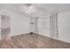 Well-lit bedroom with laminate flooring and window coverings at 2650 W Union Hills Dr # 54, Phoenix, AZ 85027