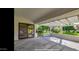 Covered patio with concrete flooring and views of the backyard and community at 13035 W Ballad W Dr, Sun City West, AZ 85375