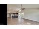 Modern kitchen with dark wood cabinets, granite countertops, and stainless steel appliances at 13035 W Ballad W Dr, Sun City West, AZ 85375