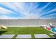 Artificial turf backyard with play area and patio at 812 E Summerside Rd, Phoenix, AZ 85042