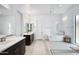 Modern bathroom with soaking tub and walk-in shower at 812 E Summerside Rd, Phoenix, AZ 85042