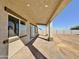 Covered patio with paver stones and access to backyard at 4145 N Del Monte Dr, Eloy, AZ 85131