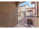 Private balcony overlooks the community courtyard at 7772 W Pipestone Pl, Phoenix, AZ 85035