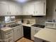 Efficient kitchen with ample cabinetry and modern appliances at 4065 E University Dr # 245, Mesa, AZ 85205