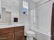 Clean bathroom with a bathtub, shower, and modern vanity at 24614 N 169Th Dr, Surprise, AZ 85387