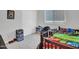 bedroom with twin bed, bean bag chair, and storage at 24614 N 169Th Dr, Surprise, AZ 85387