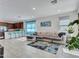 Open living area featuring a comfortable sectional sofa and stylish rug at 24614 N 169Th Dr, Surprise, AZ 85387
