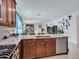 Modern kitchen with stainless steel appliances and ample cabinetry at 24614 N 169Th Dr, Surprise, AZ 85387