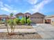 Attractive single-story home with a two-car garage at 24614 N 169Th Dr, Surprise, AZ 85387