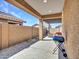 Covered patio with grill and artificial turf at 24614 N 169Th Dr, Surprise, AZ 85387