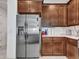 Stainless steel refrigerator in a well-equipped kitchen at 24614 N 169Th Dr, Surprise, AZ 85387