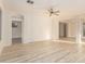 Spacious living room featuring hardwood floors and ceiling fan at 1384 E Morelos St, Chandler, AZ 85225