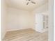 Spacious bedroom with ceiling fan and access to closet at 1384 E Morelos St, Chandler, AZ 85225