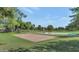 Community park with grassy areas, volleyball court, and basketball court at 1384 E Morelos St, Chandler, AZ 85225