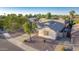 Single-story home with a two-car garage and landscaped yard at 1384 E Morelos St, Chandler, AZ 85225