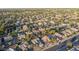 Aerial view showing a large suburban neighborhood with houses and streets at 1384 E Morelos St, Chandler, AZ 85225