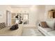 Home office with built-in shelving, a desk, and a comfortable sofa at 1384 E Morelos St, Chandler, AZ 85225