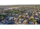 Aerial view of a residential neighborhood with houses, trees, and a park at 1384 E Morelos St, Chandler, AZ 85225