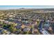 Aerial view of a residential area showcasing homes and surrounding landscape at 1384 E Morelos St, Chandler, AZ 85225
