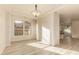 Sunlit dining area with hardwood floors and views to the backyard at 1384 E Morelos St, Chandler, AZ 85225