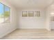 Spacious bedroom with large window and wood-look floors at 1384 E Morelos St, Chandler, AZ 85225