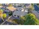 Single-story home with a grassy backyard and covered patio at 1384 E Morelos St, Chandler, AZ 85225