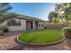 Low-maintenance backyard with artificial turf and covered patio at 1384 E Morelos St, Chandler, AZ 85225