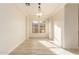 Light and airy dining room with hardwood floors and large windows at 1384 E Morelos St, Chandler, AZ 85225