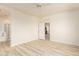 Bedroom with wood flooring and access to bathroom and kitchen at 1384 E Morelos St, Chandler, AZ 85225