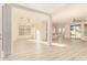Open living space with hardwood floors and access to backyard at 1384 E Morelos St, Chandler, AZ 85225