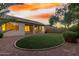 Relaxing backyard oasis with a grassy area and covered patio at 1384 E Morelos St, Chandler, AZ 85225
