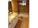 Bathroom featuring a shower/tub combo and granite countertop at 908 S Ocotillo Dr, Apache Junction, AZ 85120